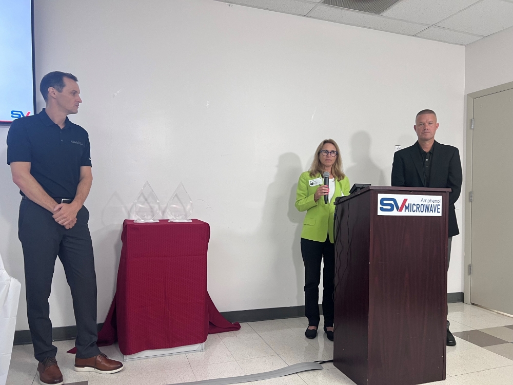 Lori Rice and Jon Adkins presenting awards with SV Microwave General Manager Andrew Dinsdale